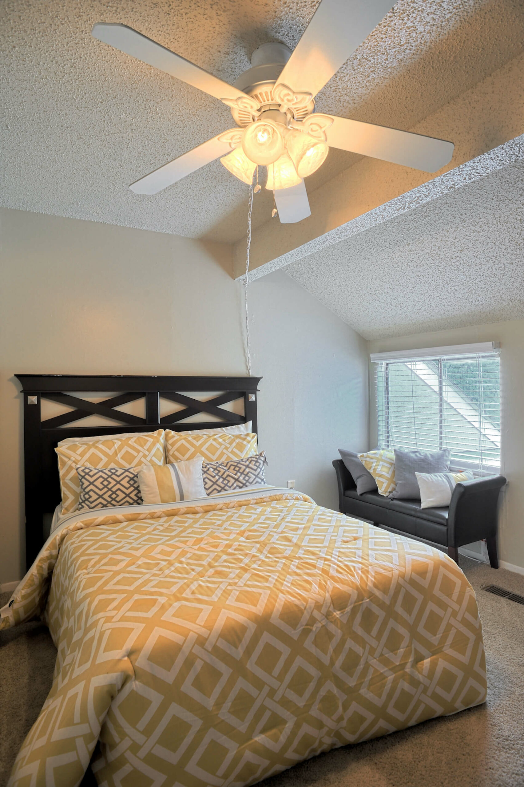 bedroom with a ceiling fan of an apartment at fairway view
